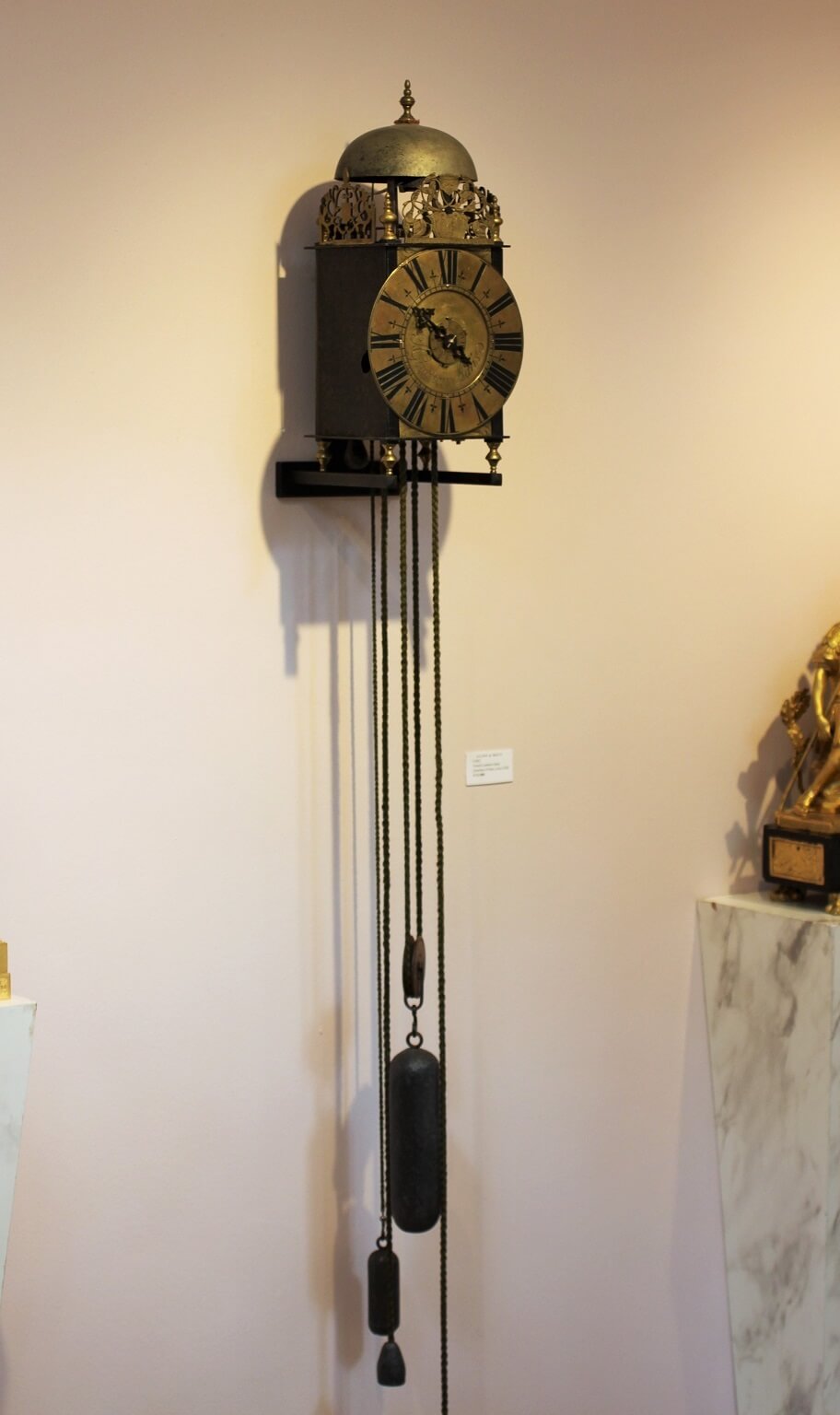 French lantern iron brass wall clock Gouchon 1720