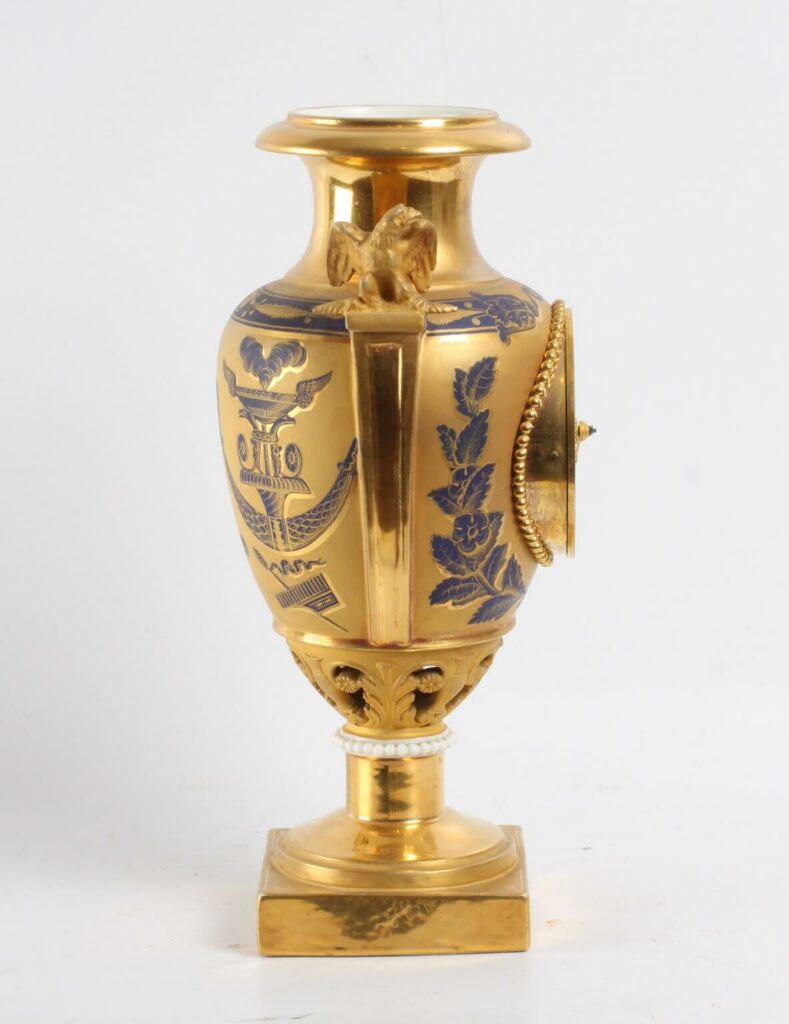 A French Empire gilt 'Sevres' urn mantel clock, circa 1800 - Gude & Meis