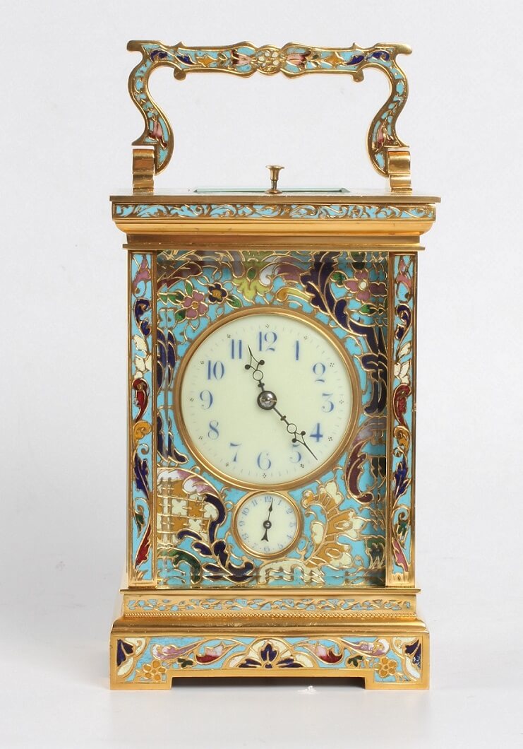 A very rare French gilt striking carriage clock and musical