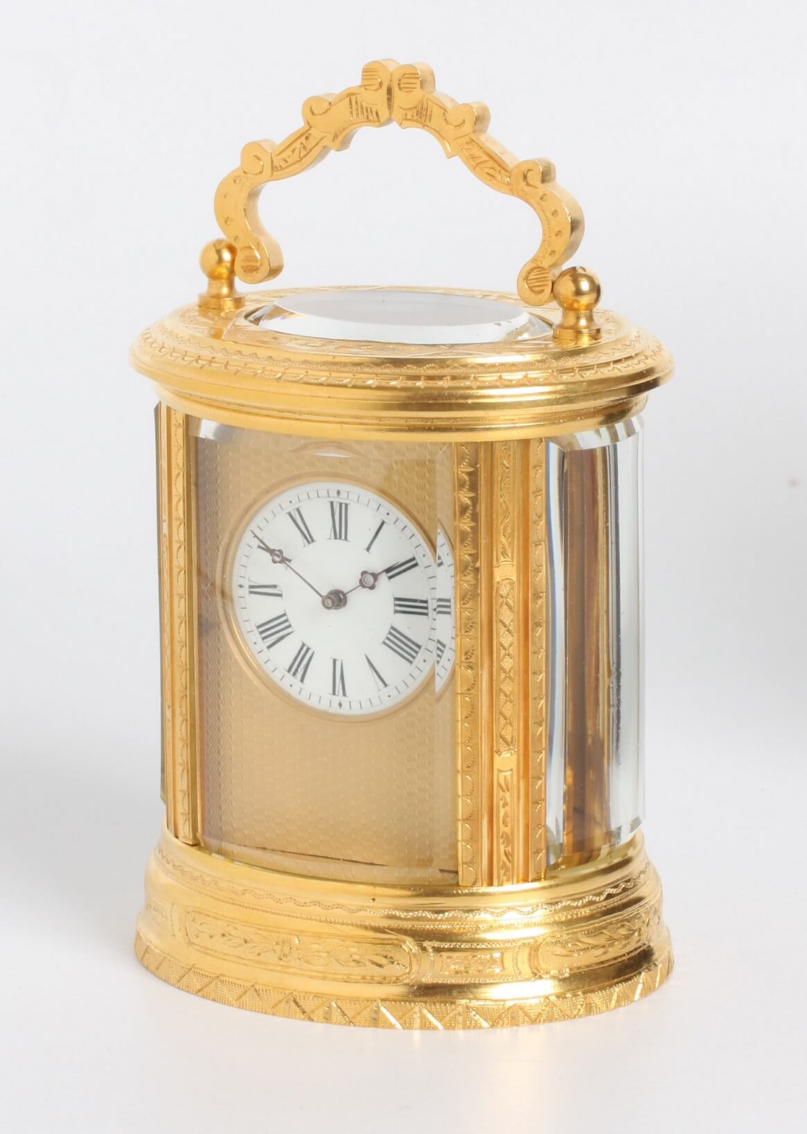 French gilt oval carriage clock engraved 1870