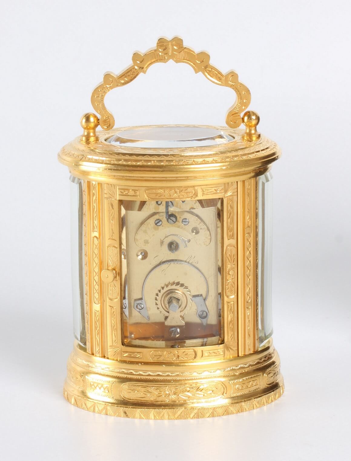 French gilt oval carriage clock engraved 1870