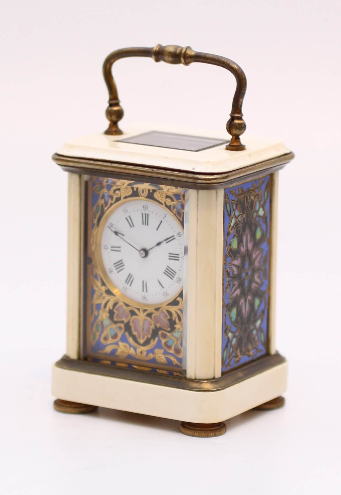 A miniature French cloisonne and ivory carriage timepiece, circa 1880 ...