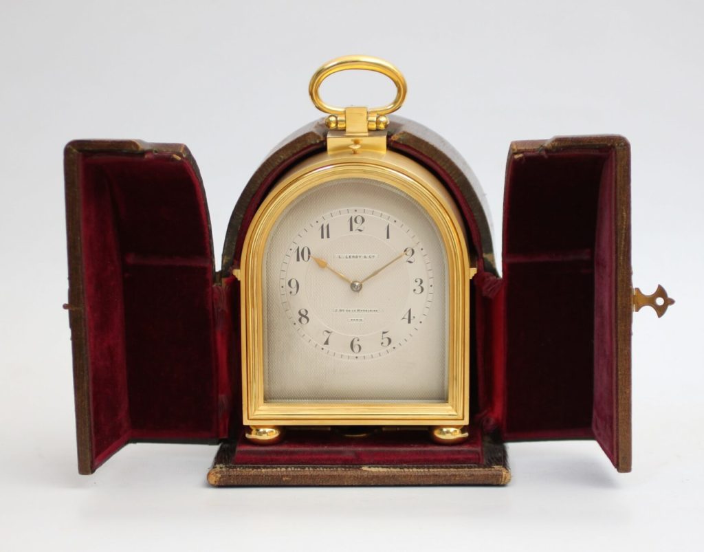 A fine French gilt brass humpback travel clock by L. Leroy & Cie, circa