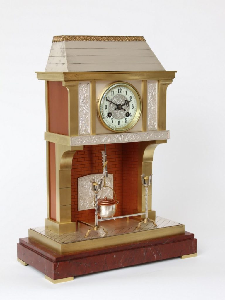 A French brass and marble industrial mantel clock, fireplace by Guilmet