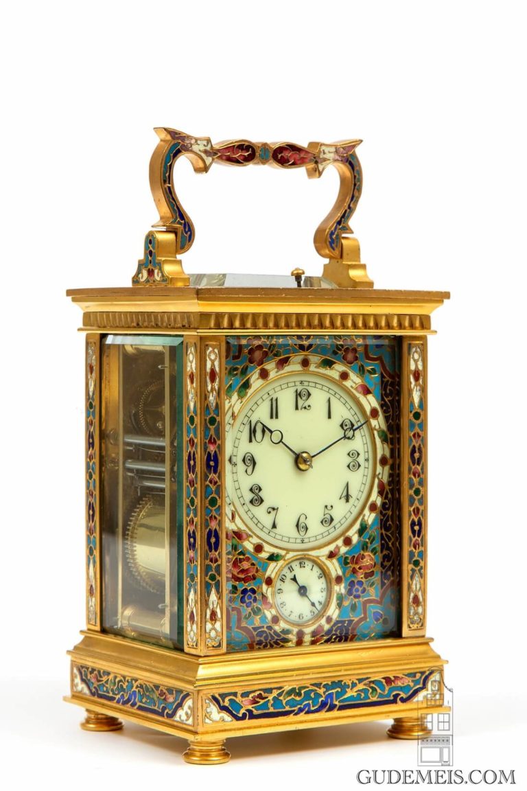 A French gilt brass cloisonne enamel carriage clock with petite