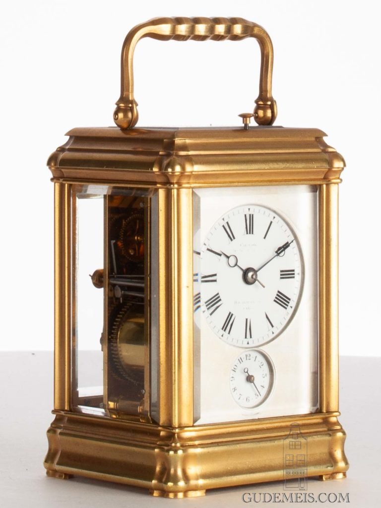A small French gilt brass gorge case striking and alarm carriage clock ...