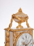 French-Louis XVI-white-marble-ormlu-gilt-bronze-borne-antique-striking-mantel-clock-Wolff-Paris