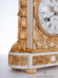 French-Louis XVI-white-marble-ormlu-gilt-bronze-borne-antique-striking-mantel-clock-Wolff-Paris