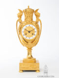 French-Empire-ormolu-gilt-bronze-striking-antique-urn-mantel-clock-aux Tetes-de-guerriers-