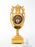 French-Empire-ormolu-gilt-bronze-striking-antique-urn-mantel-clock-aux Tetes-de-guerriers-