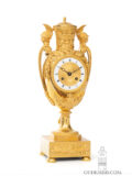 French-Empire-ormolu-gilt-bronze-striking-antique-urn-mantel-clock-aux Tetes-de-guerriers-