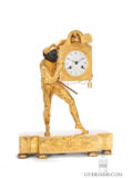 French-Empire-gilt-bronze-ormolu-sculptural-harlequin-commedia-dell-arte-mantel-clock-Thomire-