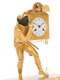 French-Empire-gilt-bronze-ormolu-sculptural-harlequin-commedia-dell-arte-mantel-clock-Thomire-