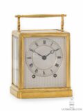 French-gilt-brass-one-piece-series I-Paul-Garnier-striking-travel-carriage-clock-Baullier et fils-Paris-